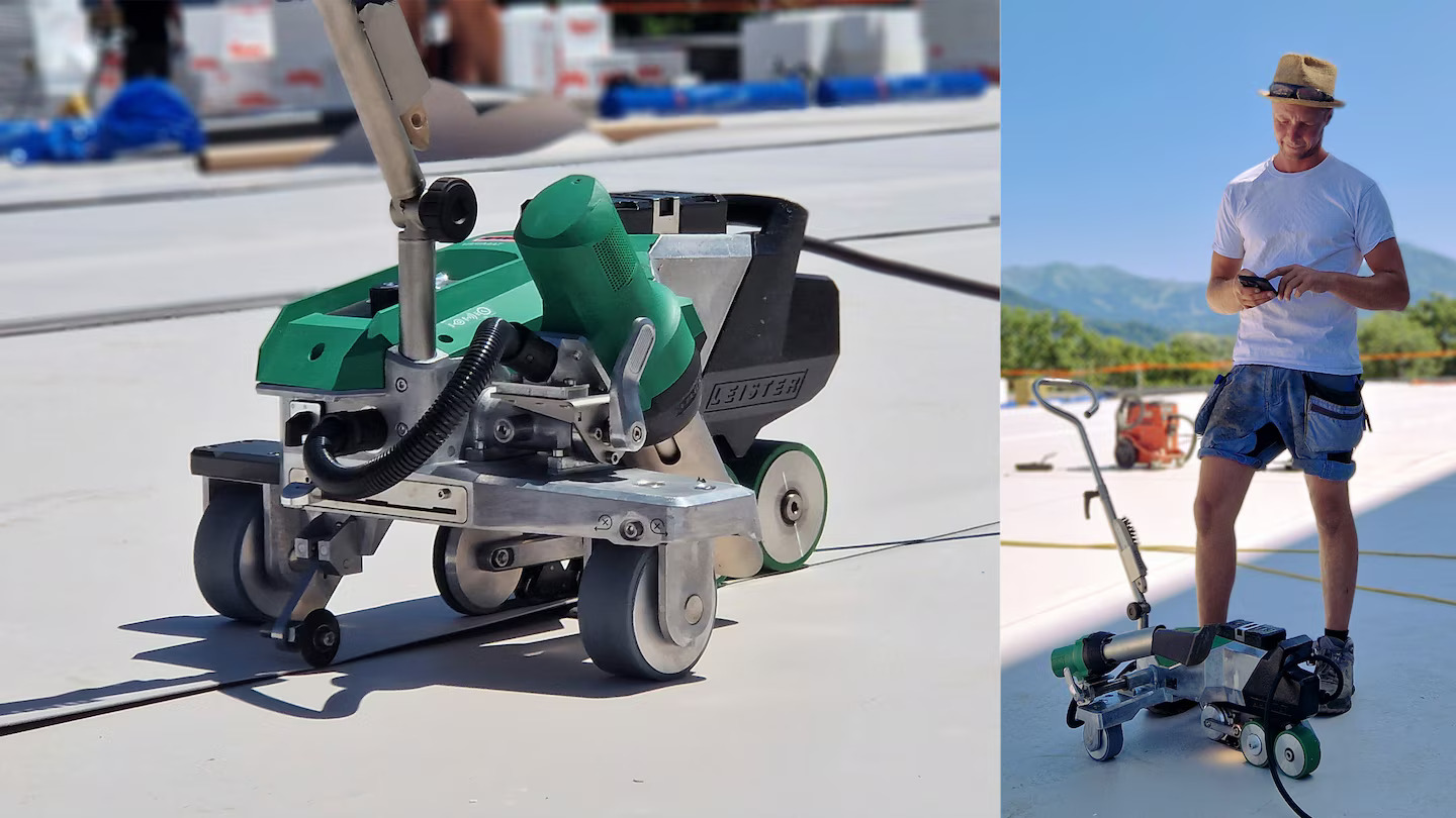 Máquina de soldagem Leister VARIMAT 700 em operação durante a vedação de telhado industrial, com controle digital via aplicativo myLeister